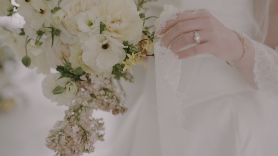 Columbus, Ohio top rated wedding florist created an off white and yellow bouquet for a bride