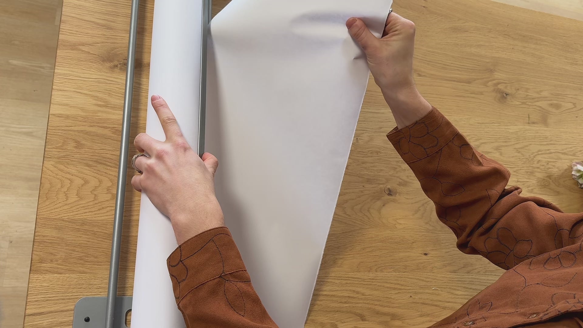 Columbus, Ohio local florist packaging up a floral arrangement for a customer